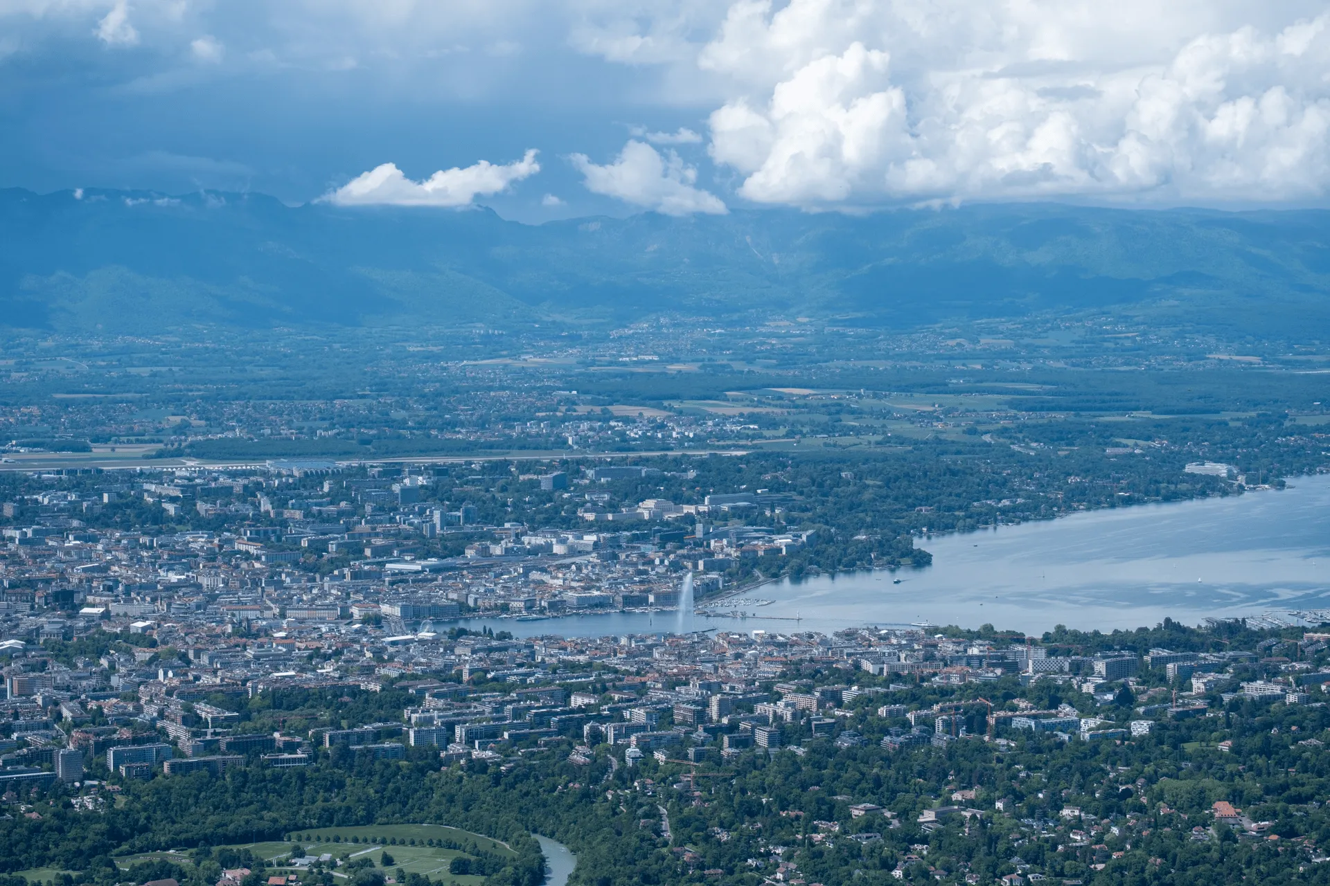 "A closer view Geneva's Jet d'Eau fountain from the mountain"