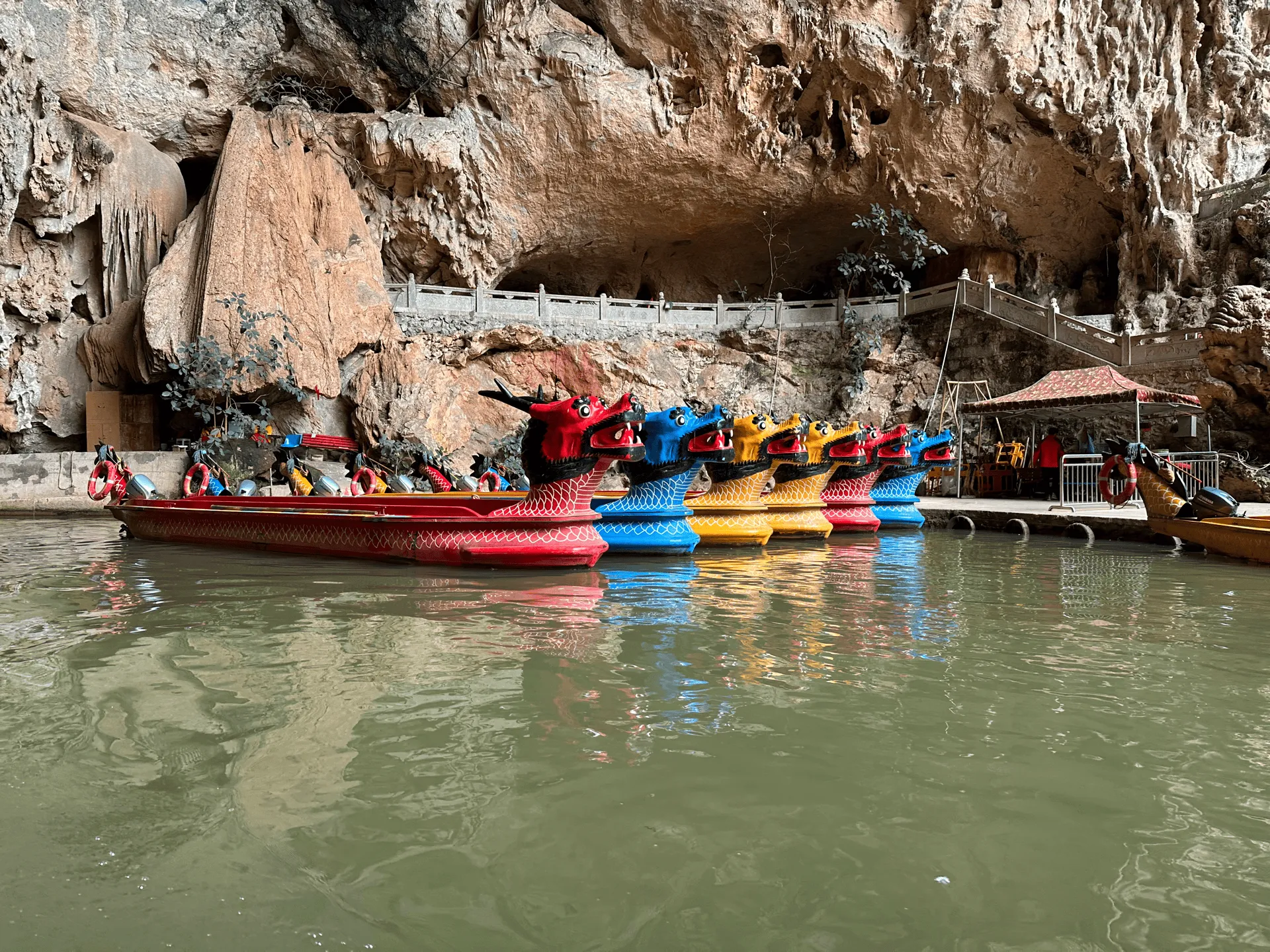 Multiple dragon boats docked at the station