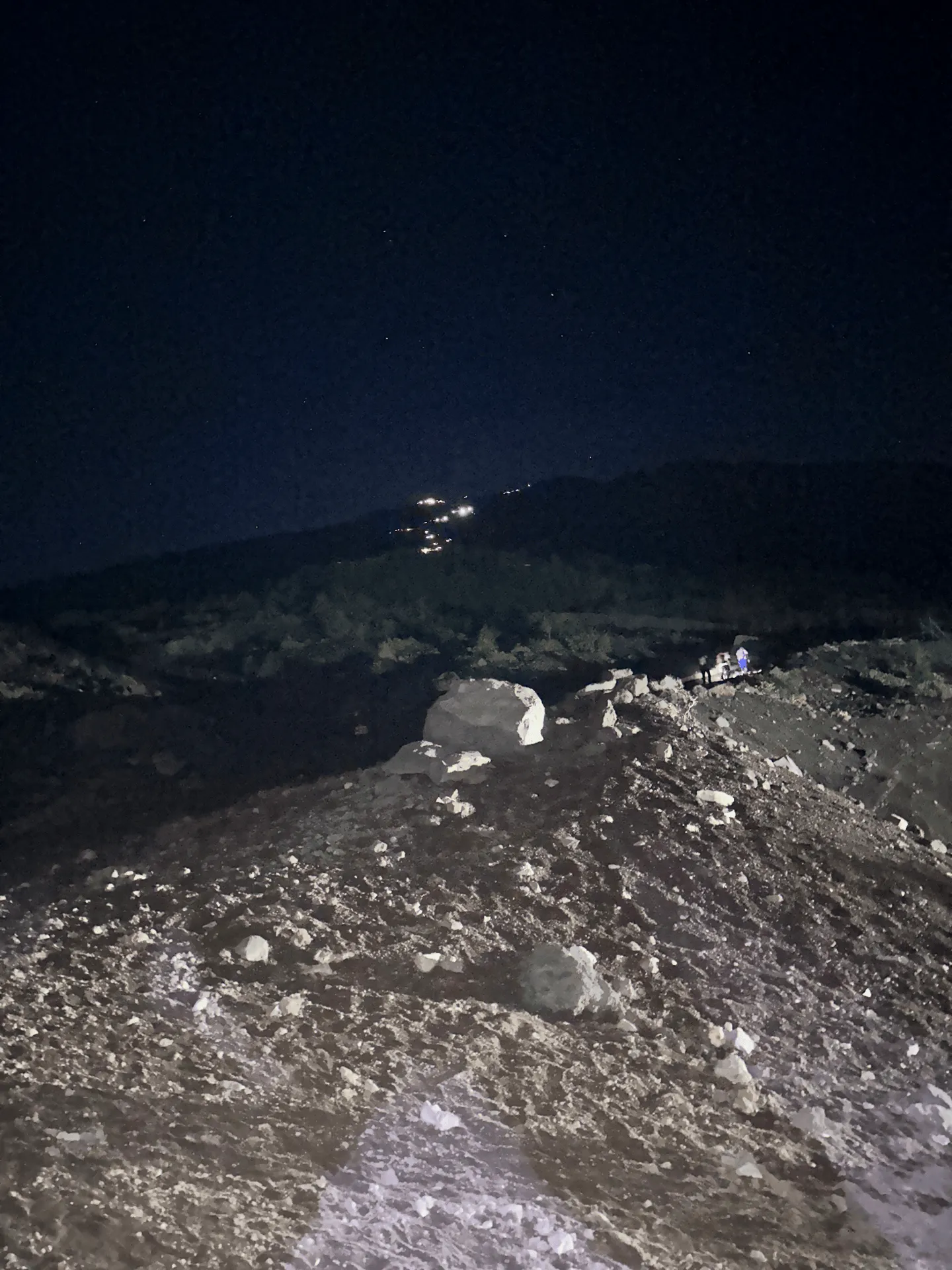 Looking up towards the peak, you can see tiny little lights