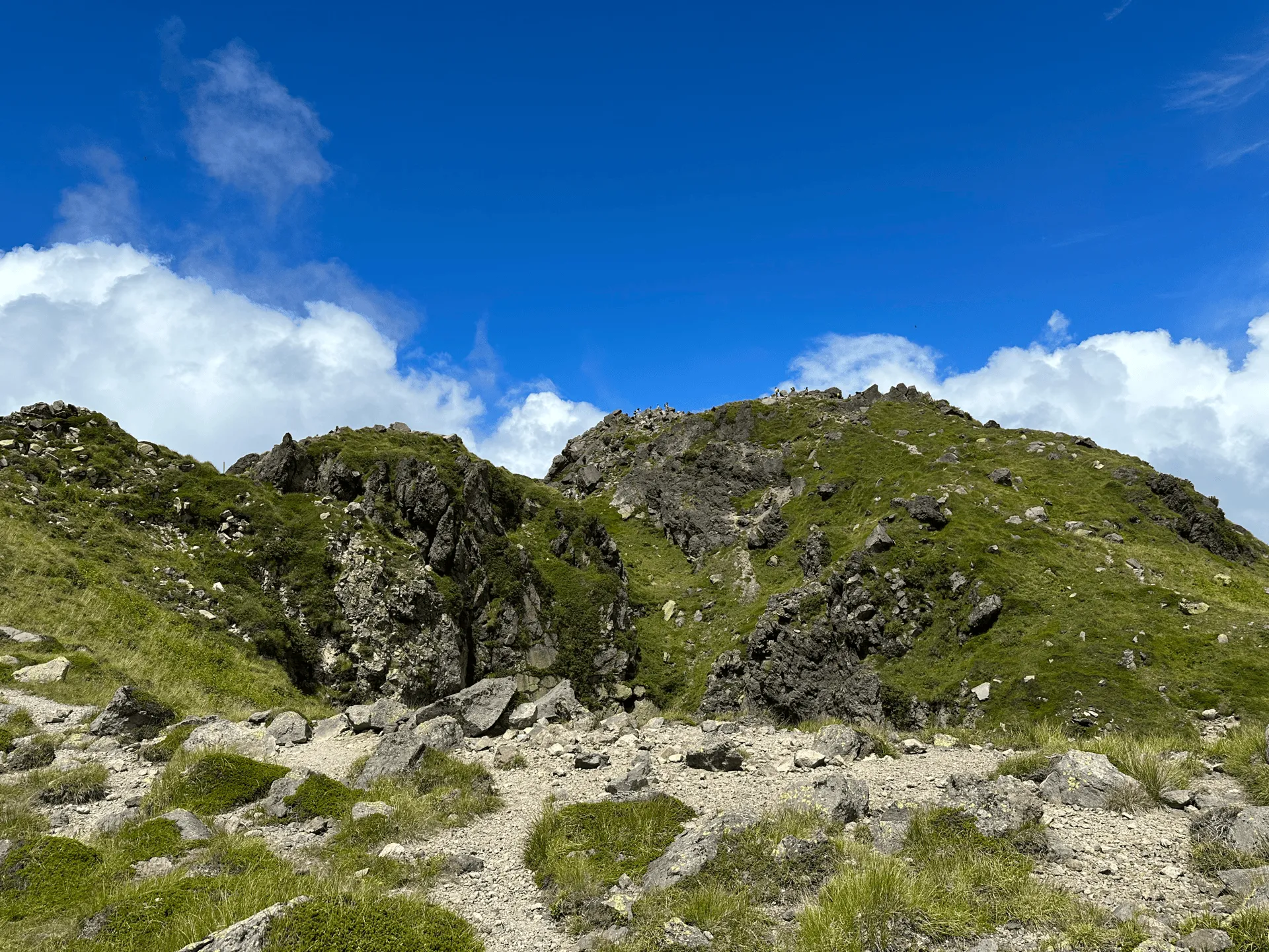 "Hikers gathered around the summit of Mt Nikko-Shirane"