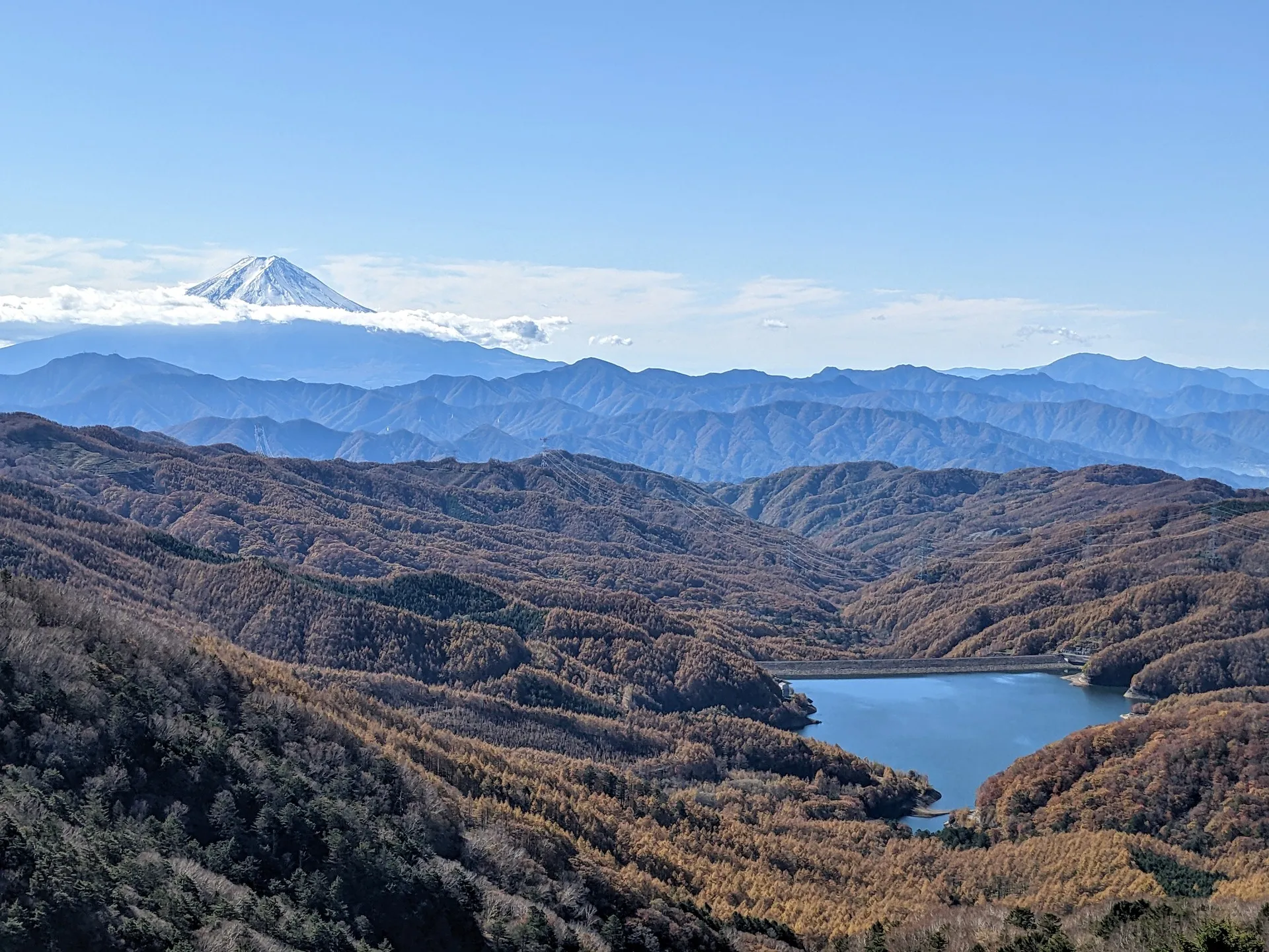 Mt Fuji from Mt Daibosatsu, with Kamihikawa Dam visible in the foreground
